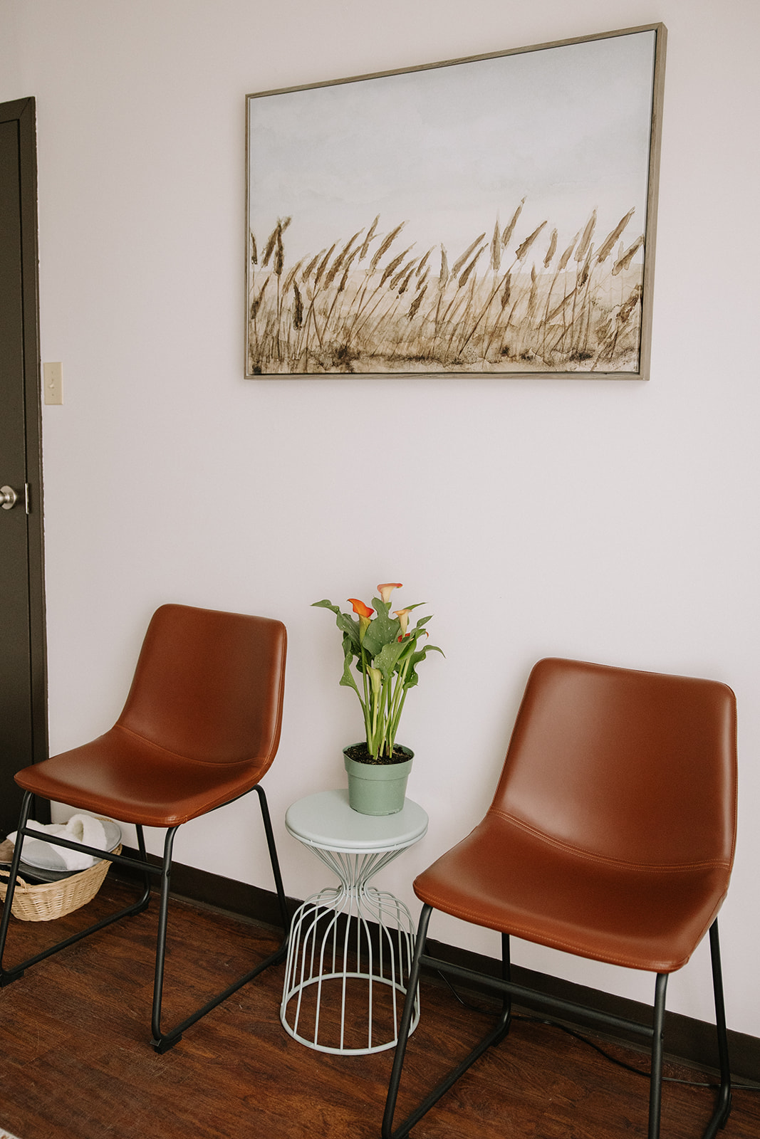 Welcoming therapy waiting room at The Mindful Place in Cambridge Ontario with chairs and calming decor.