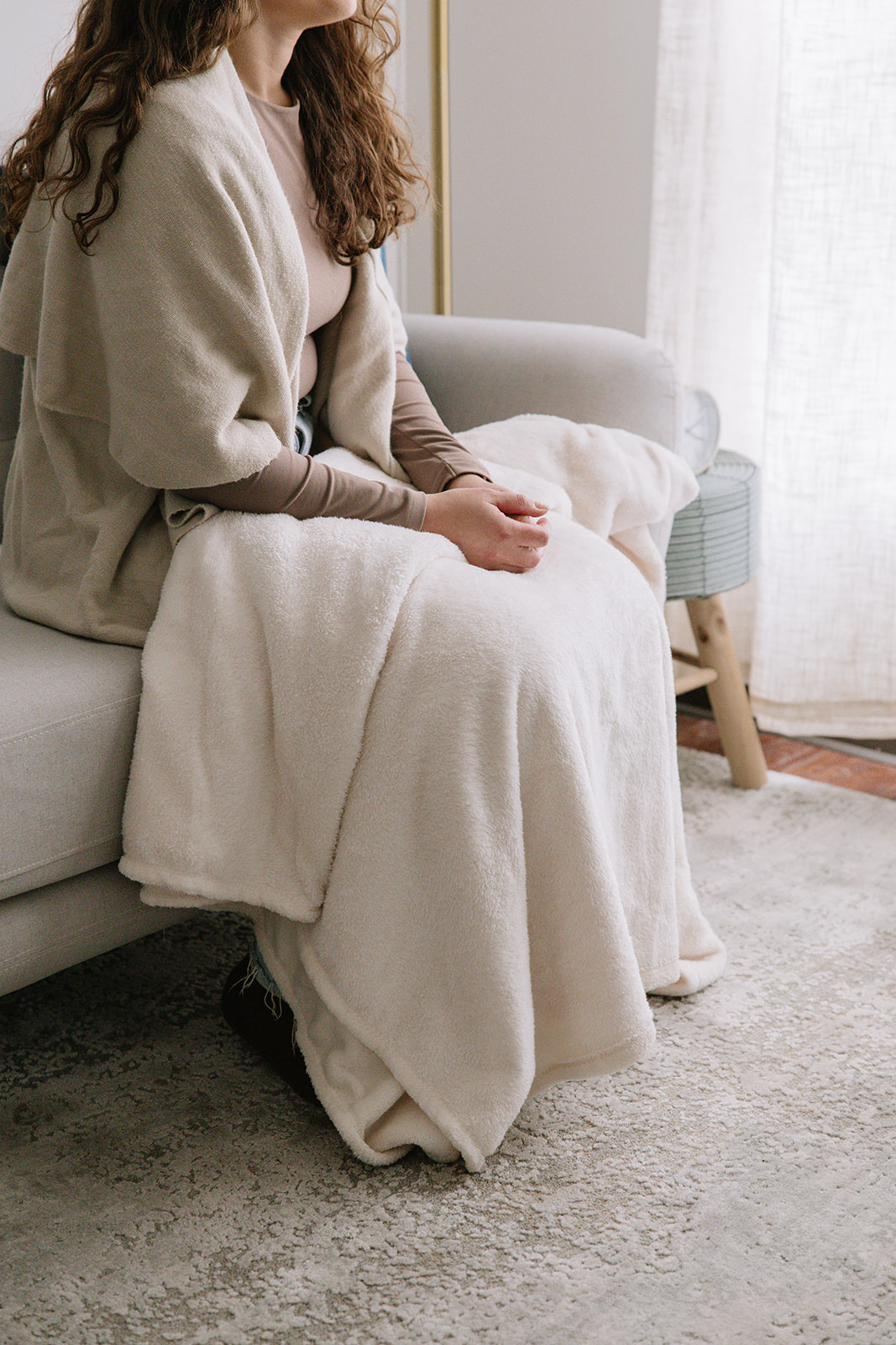 Client seated in a calm therapy space at The Mindful Place in Cambridge Ontario.