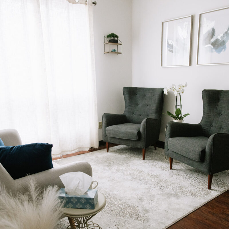 Spacious therapy room with comfortable seating